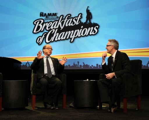 Ray Kurzweil and Joe Lamond, CEO of the National Association of Music Merchants (NAMM), on stage at the NAMM Breakfast of Champions, January 19, 2012 in Anaheim, CA. (credit: NAMM/David Livingston)