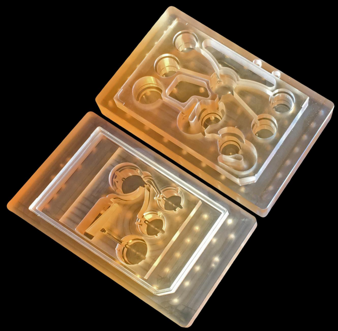 To measure the effects of drugs on different parts of the body, this microfluidic platform can connect engineered tissues from up to 10 artificial organs, allowing researchers to accurately replicate human-organ interactions for weeks at a time. (credit: Felice Frankel)